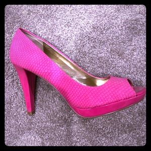 Pink peep-toe pumps